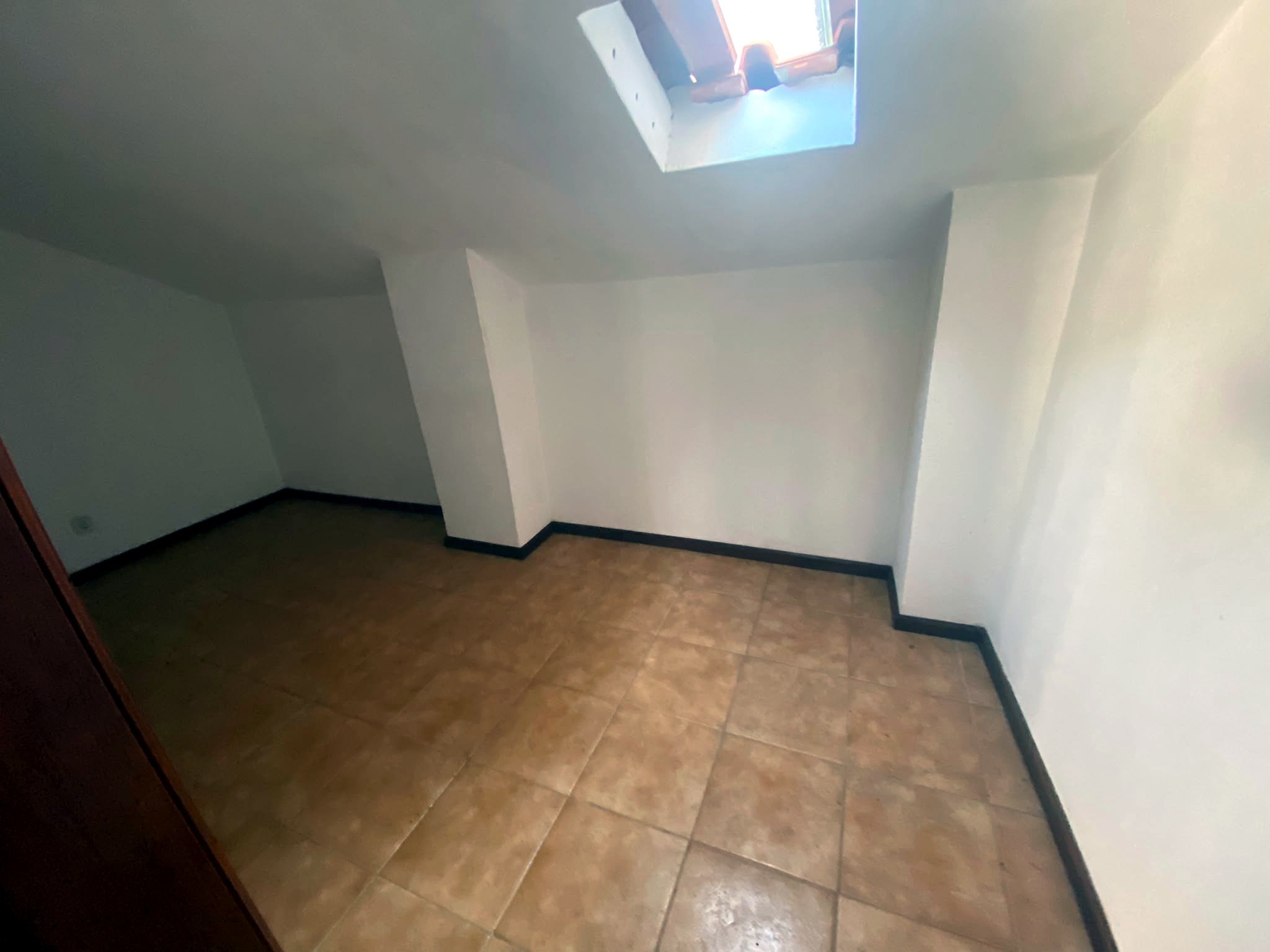 Upper-floor room with skylight